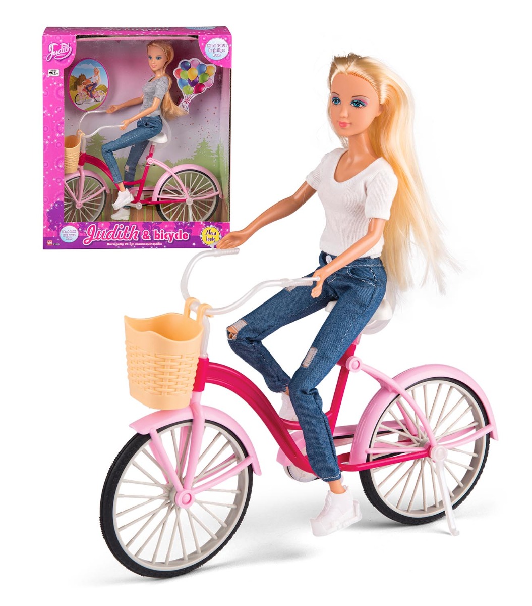 Judith Dukke på cykel med cykelkurv